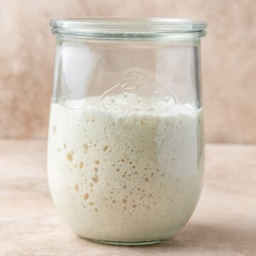 close up of sourdough starter in jar.