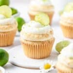 key lime cupcakes with key lime pie filling and graham cracker crumbs.