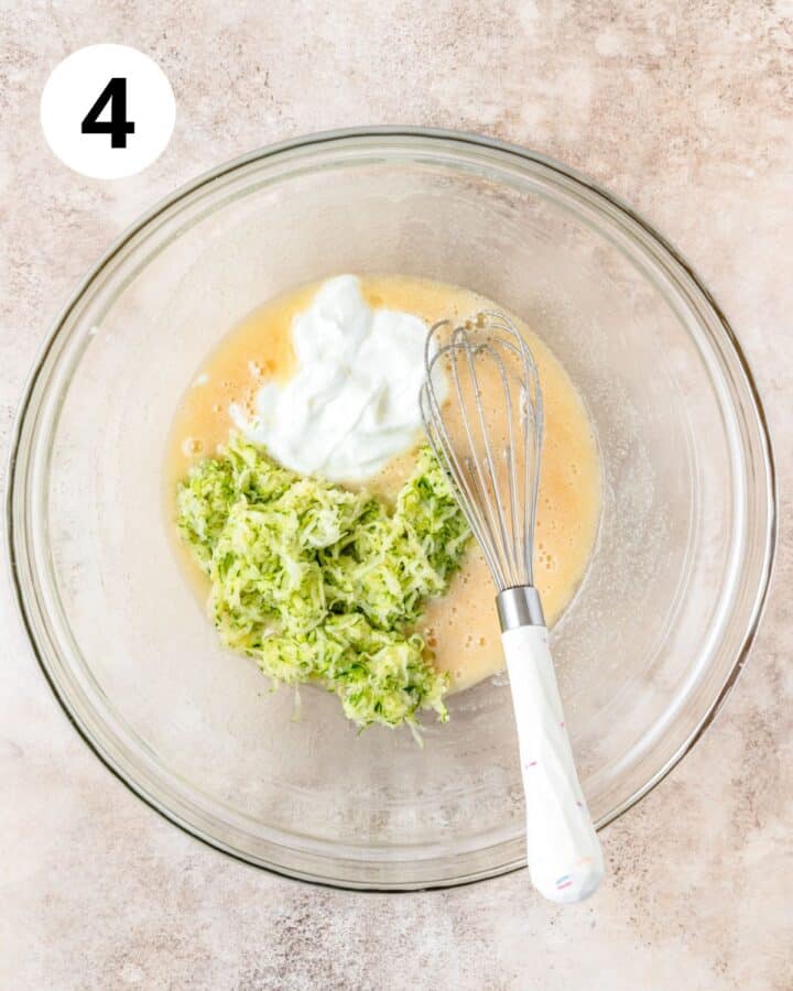 adding shredded zucchini and yogurt to muffin batter.
