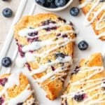 blueberry cornmeal scones drizzled with lemon glaze.
