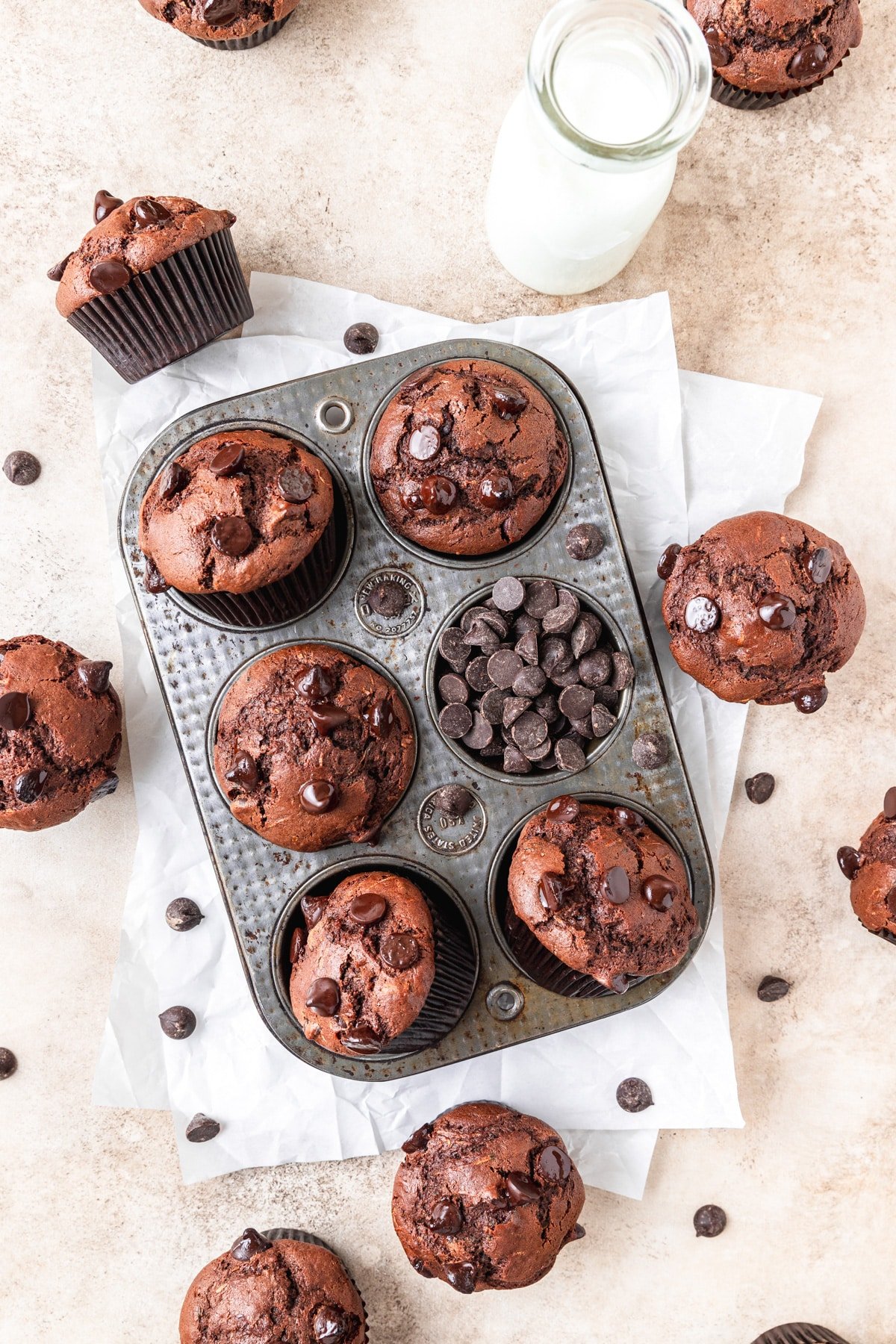 chocolate zucchini muffins in muffin tray.