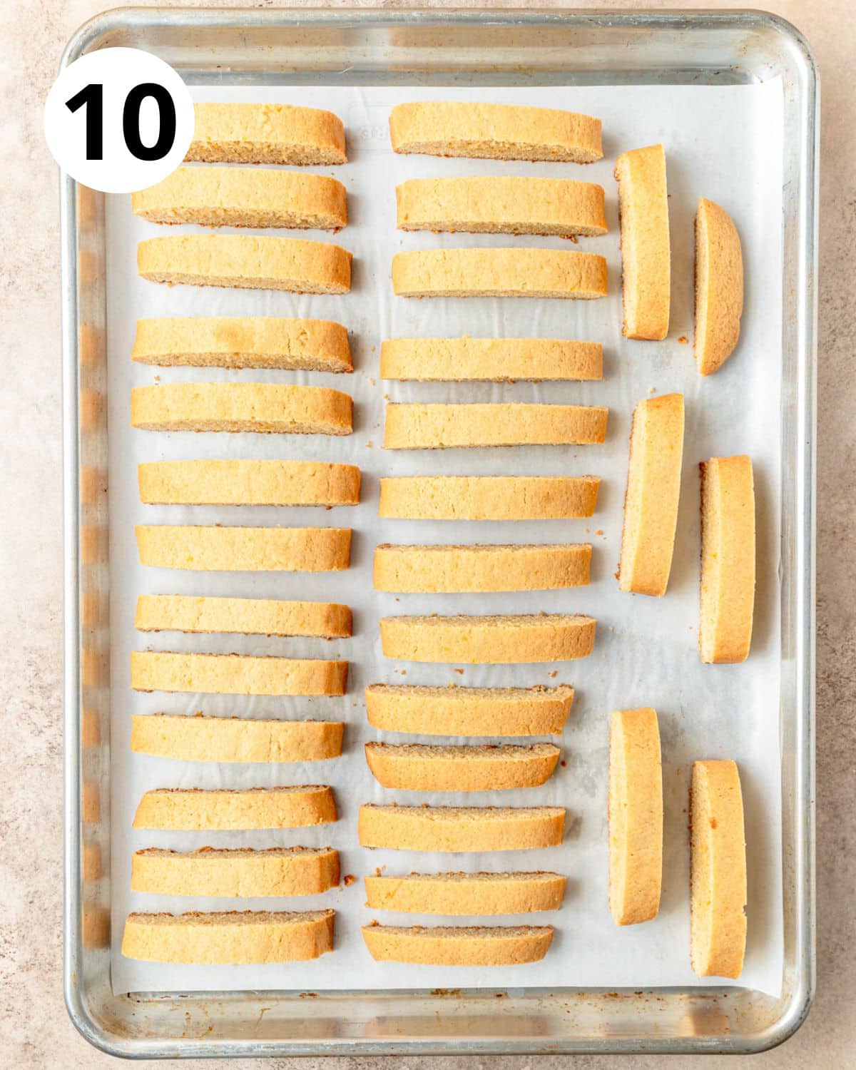 orange biscotti slices after second bake. 