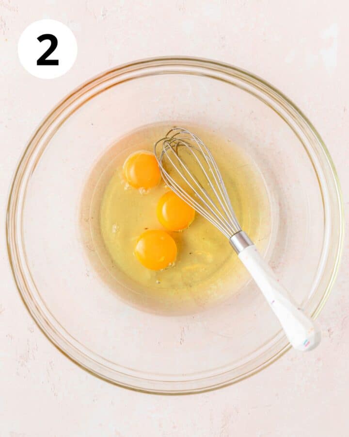 oil and eggs in bowl. 