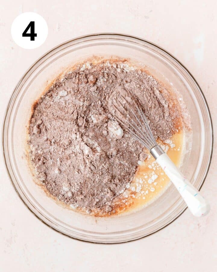 adding dry ingredients to batter.