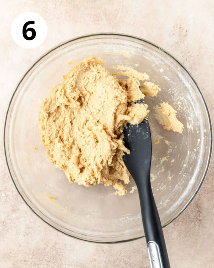 orange biscotti dough in bowl. 