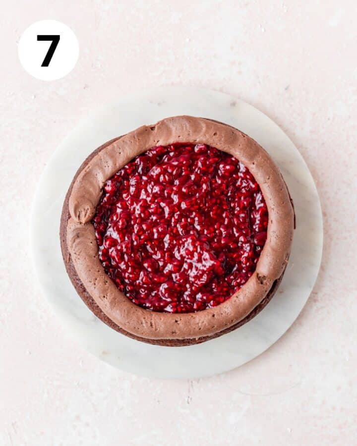 filling chocolate cake with homemade raspberry filling. 