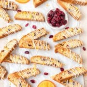 cranberry orange biscotti drizzled with white chocolate.