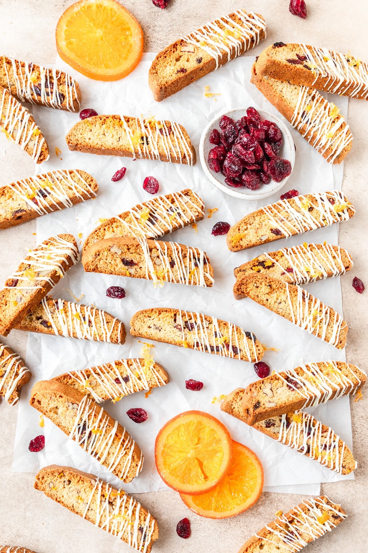 cranberry orange biscotti drizzled with white chocolate. 