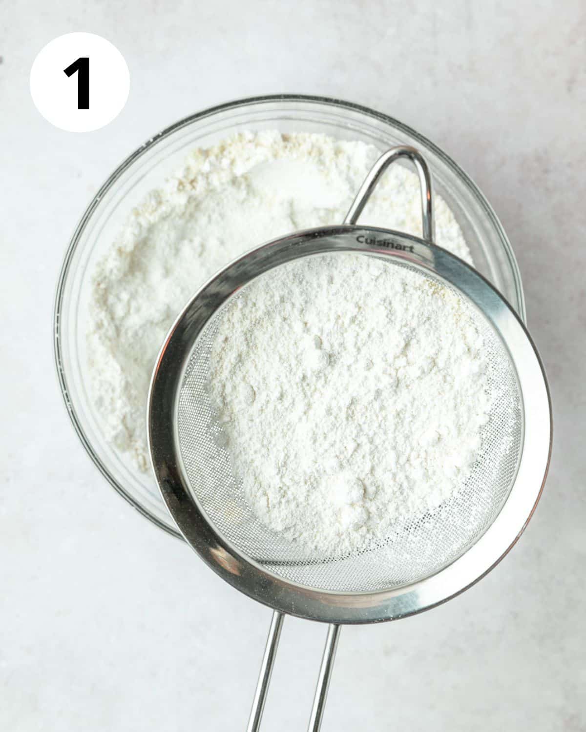 sifting together dry ingredients.
