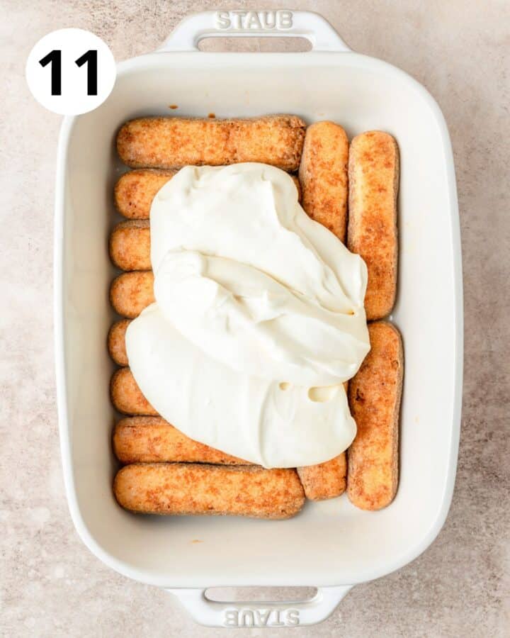 spreading layer of mascarpone over ladyfingers. 