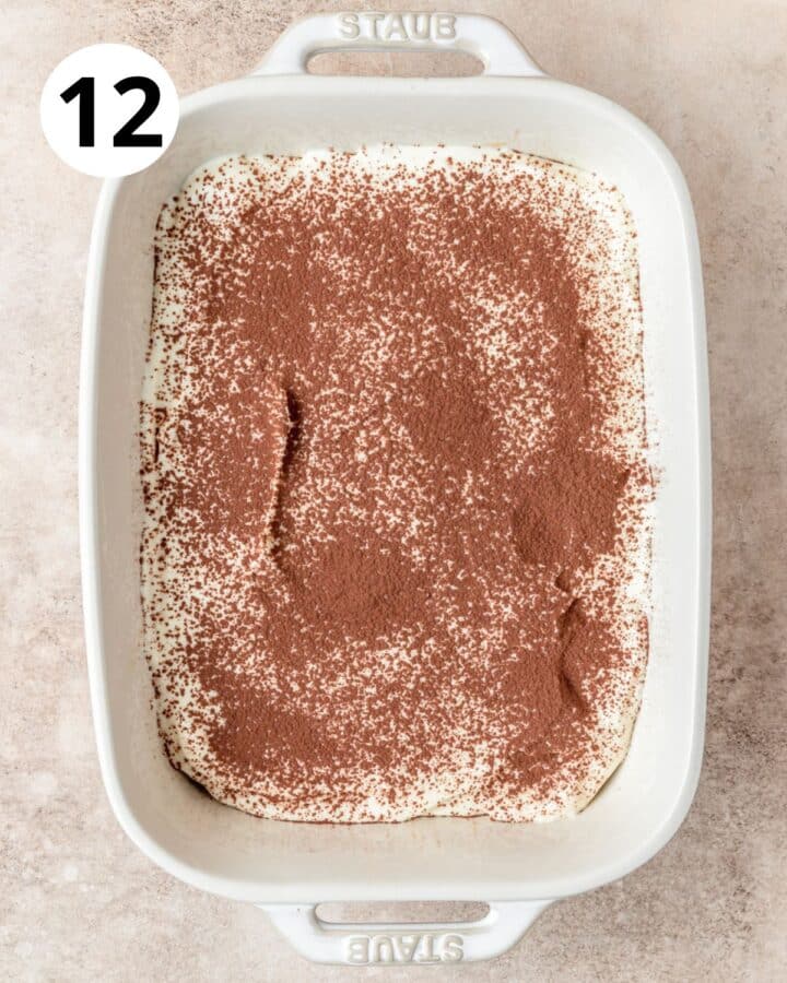 dusting first layer with cocoa powder.