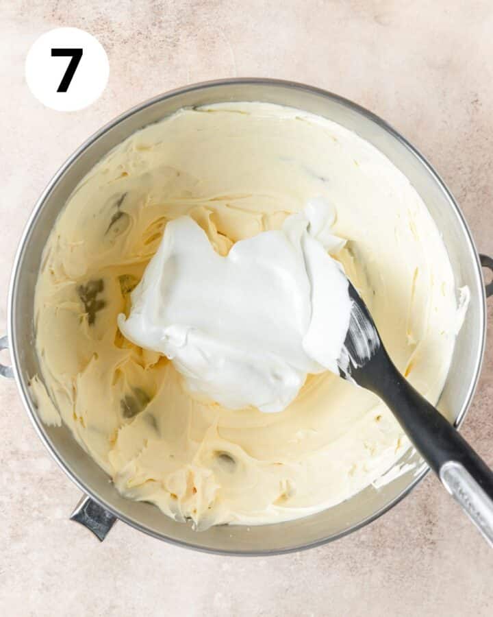 folding whipped egg whites into the mascarpone mixture.