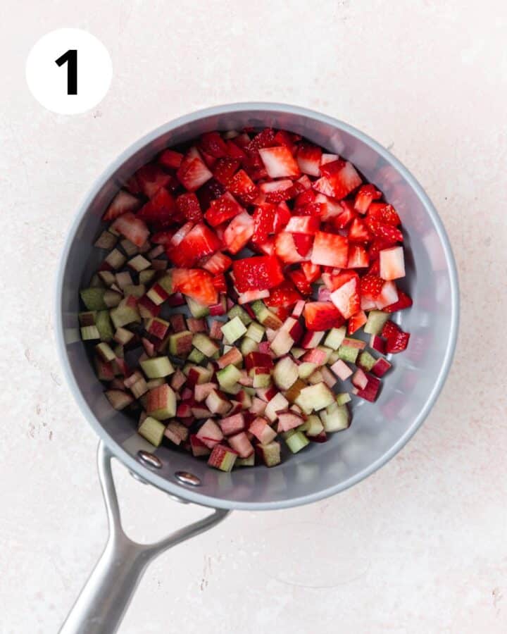 diced rhubarb and strawberries in pot.