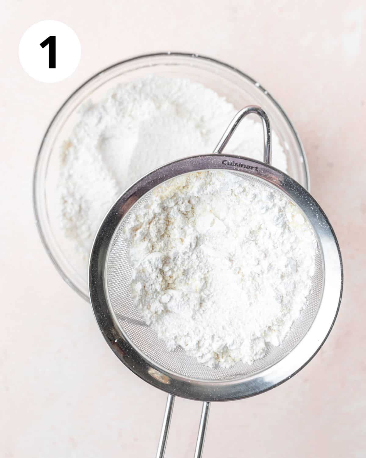 sifting together dry ingredients.