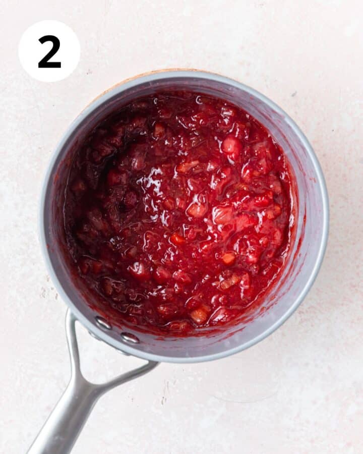 homemade strawberry rhubarb jam in pot.