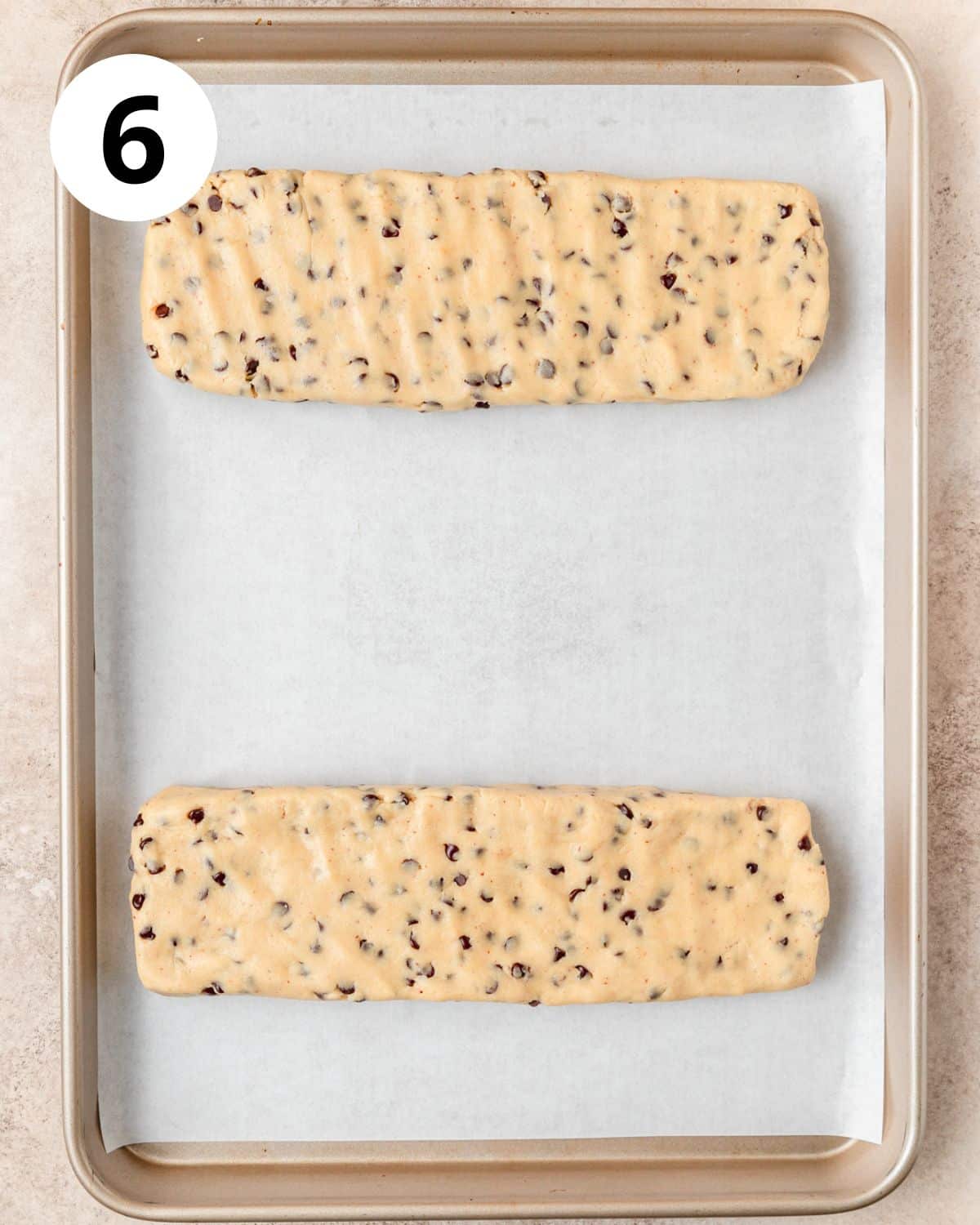 logs of chocolate chip biscotti before first bake.