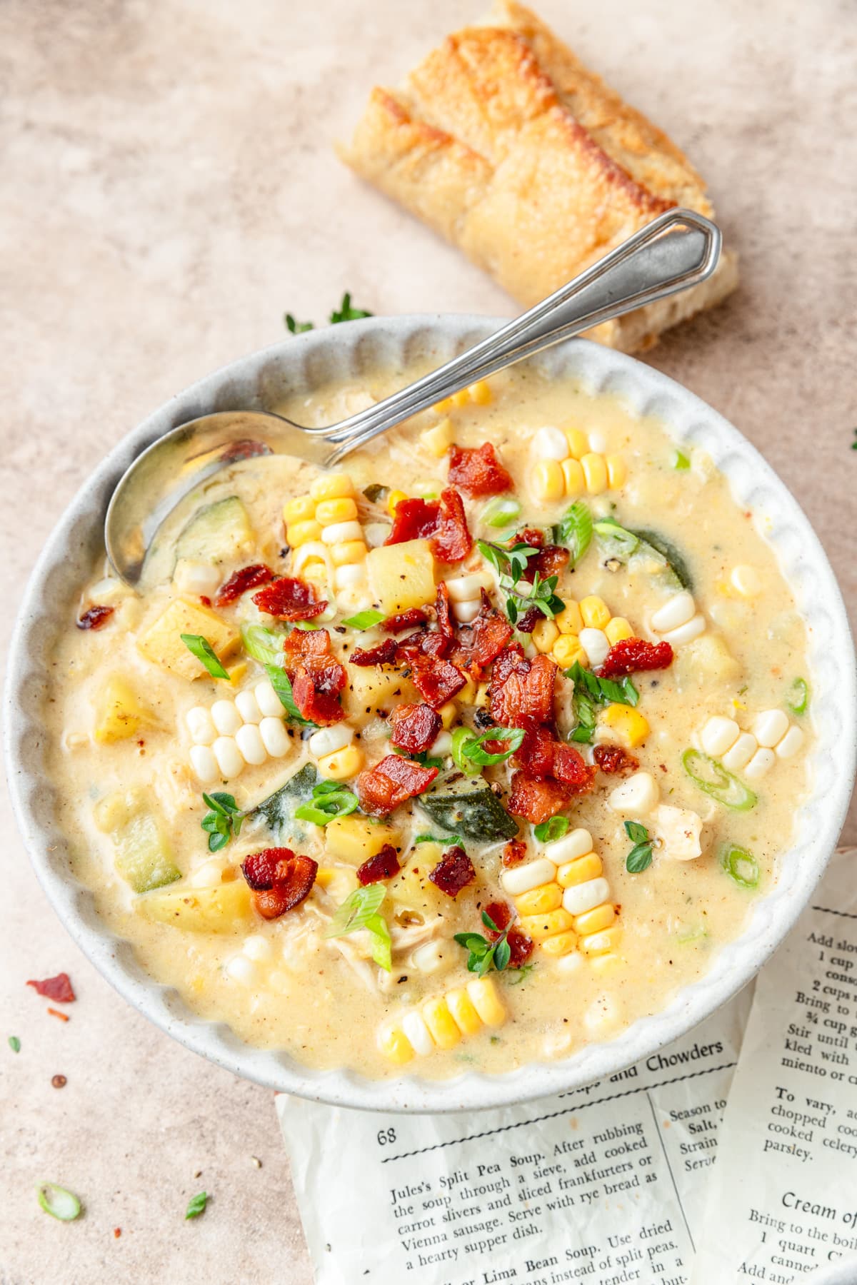 bowl of chicken corn chowder with crispy bacon.