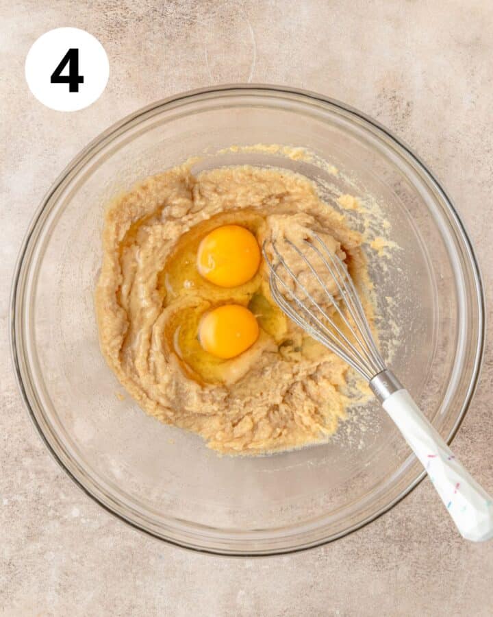 adding eggs to batter.