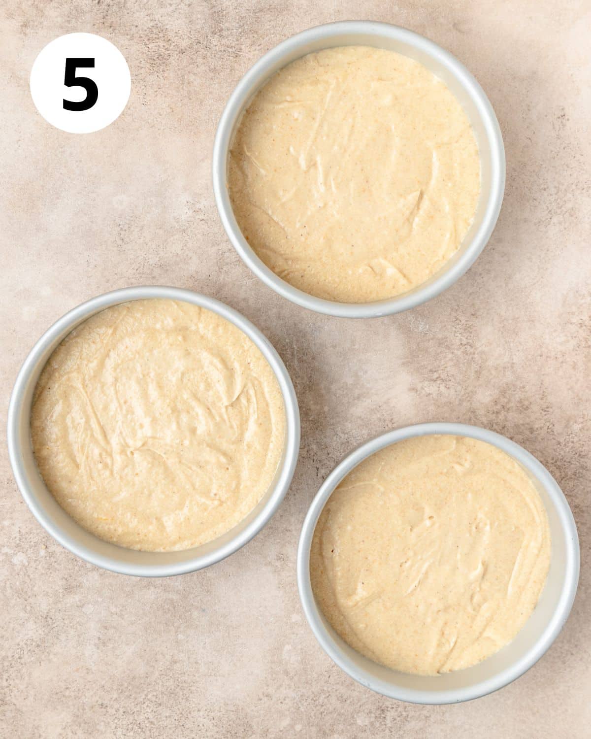 eggnog cake layers before baking. 