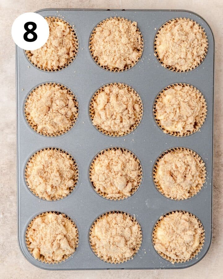eggnog muffins topped with streusel before baking.