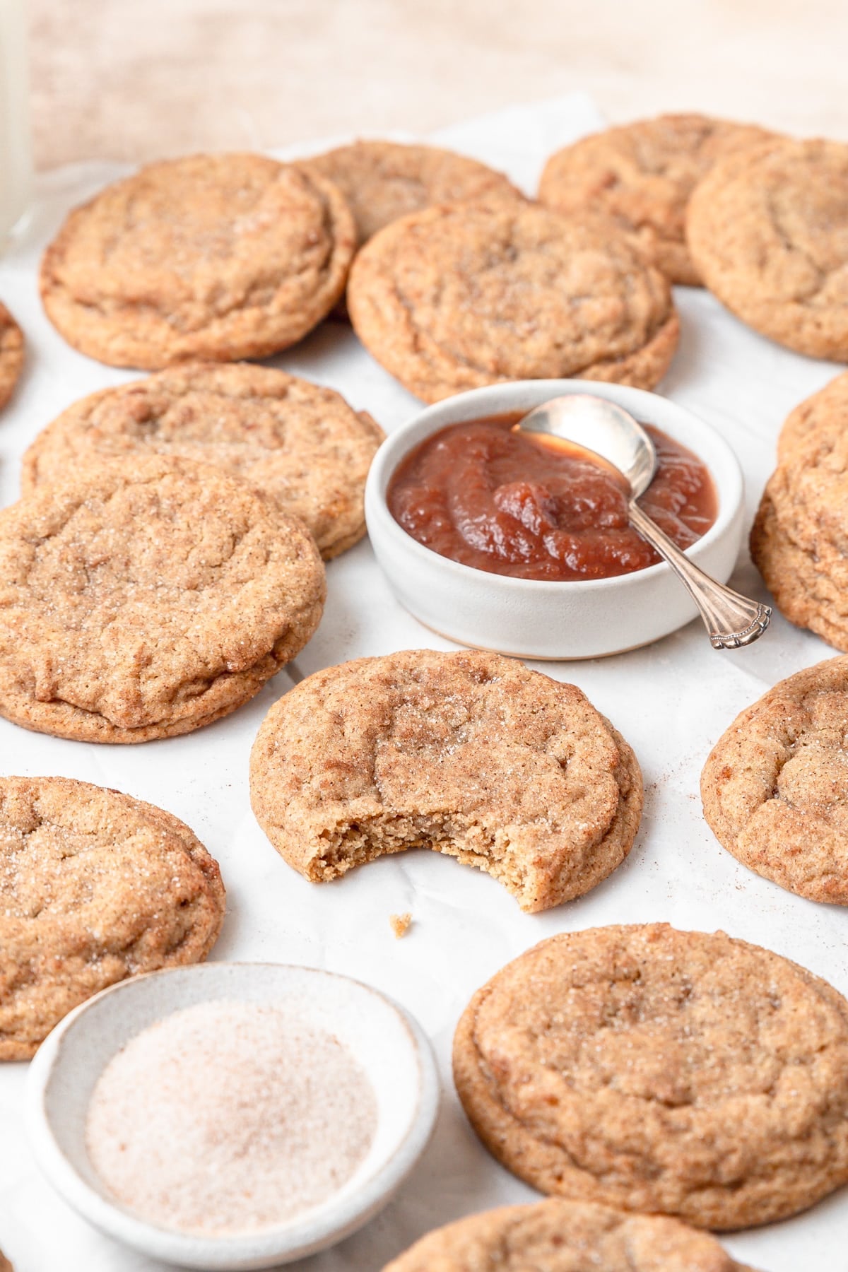 bite taken out of apple butter cookie.