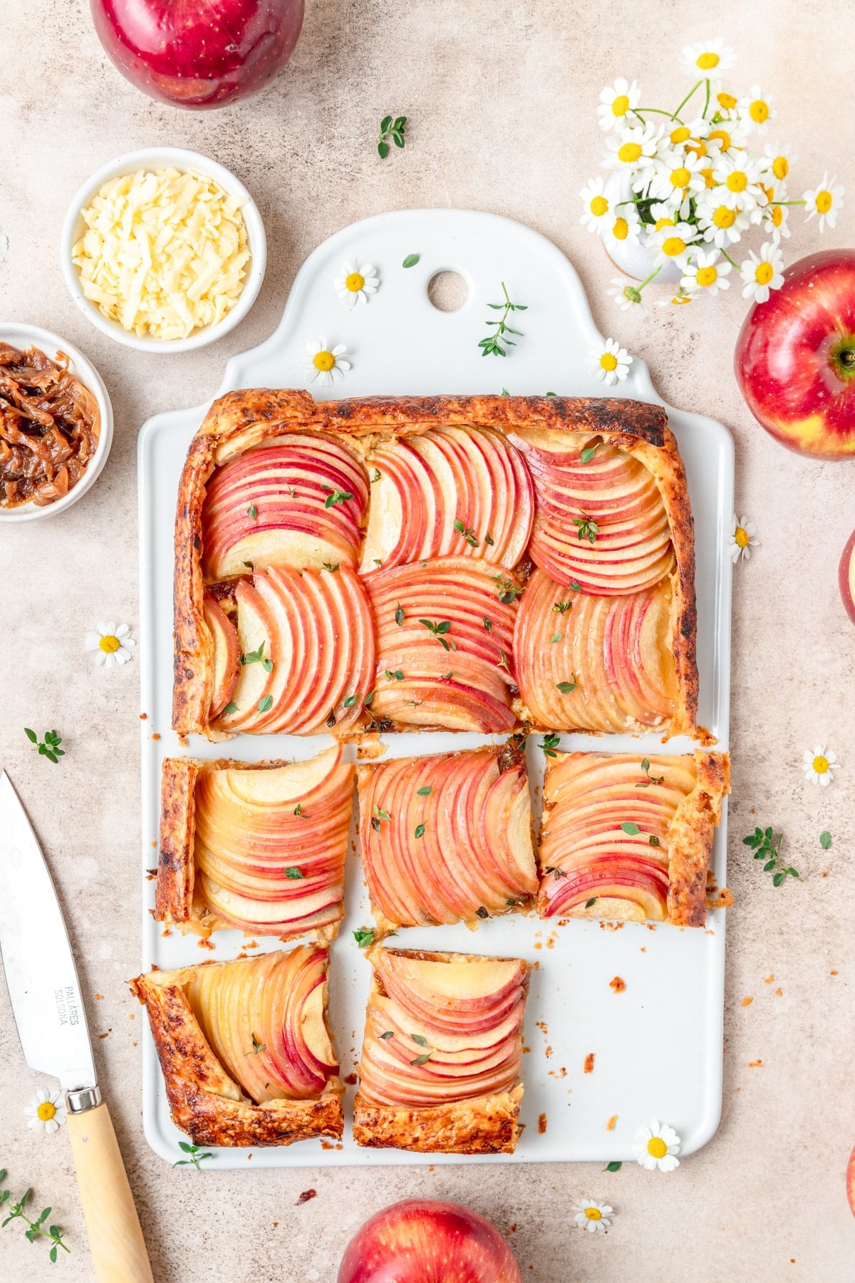 apple cheddar tart cut into squares.