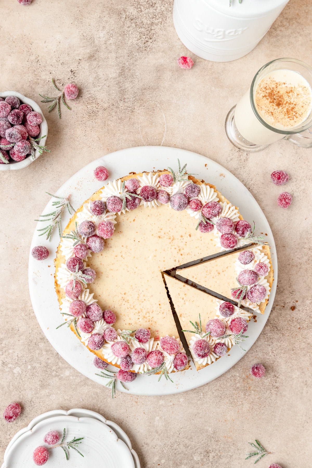 slices of eggnog cheesecake cut out.