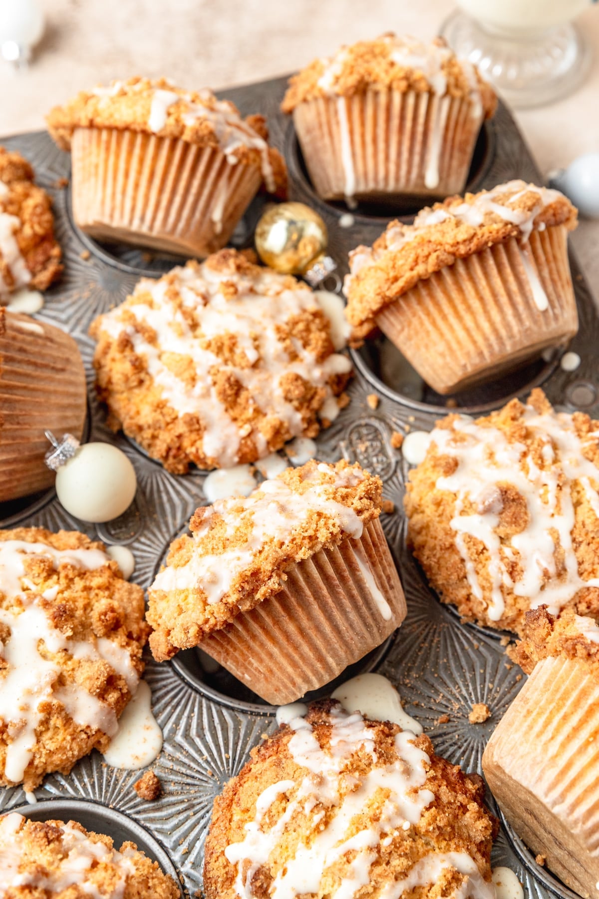 eggnog muffins topped with streusel and eggnog drizzle. 