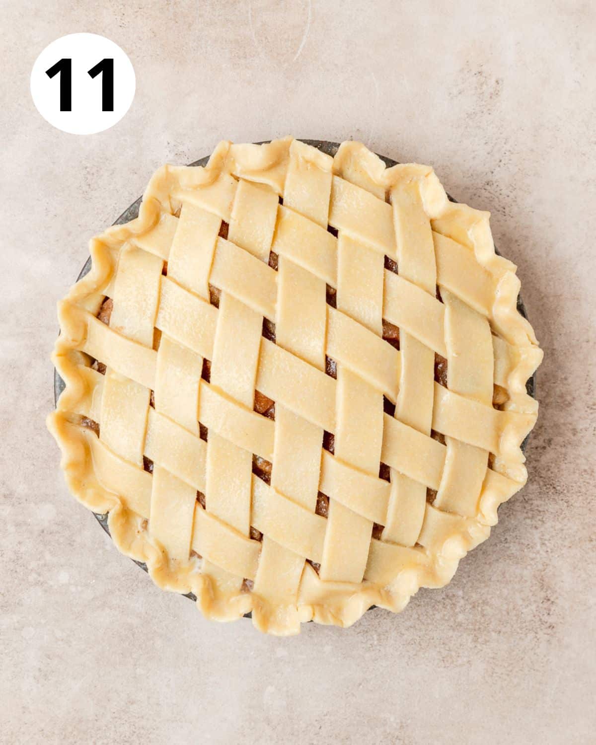 apple pie brushed with egg was and sprinkled with sugar before baking.