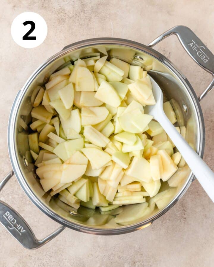sliced apples in pot.