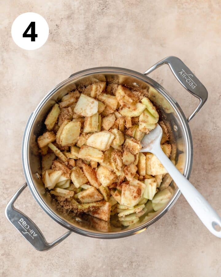 sliced apples coated in sugar and spices.