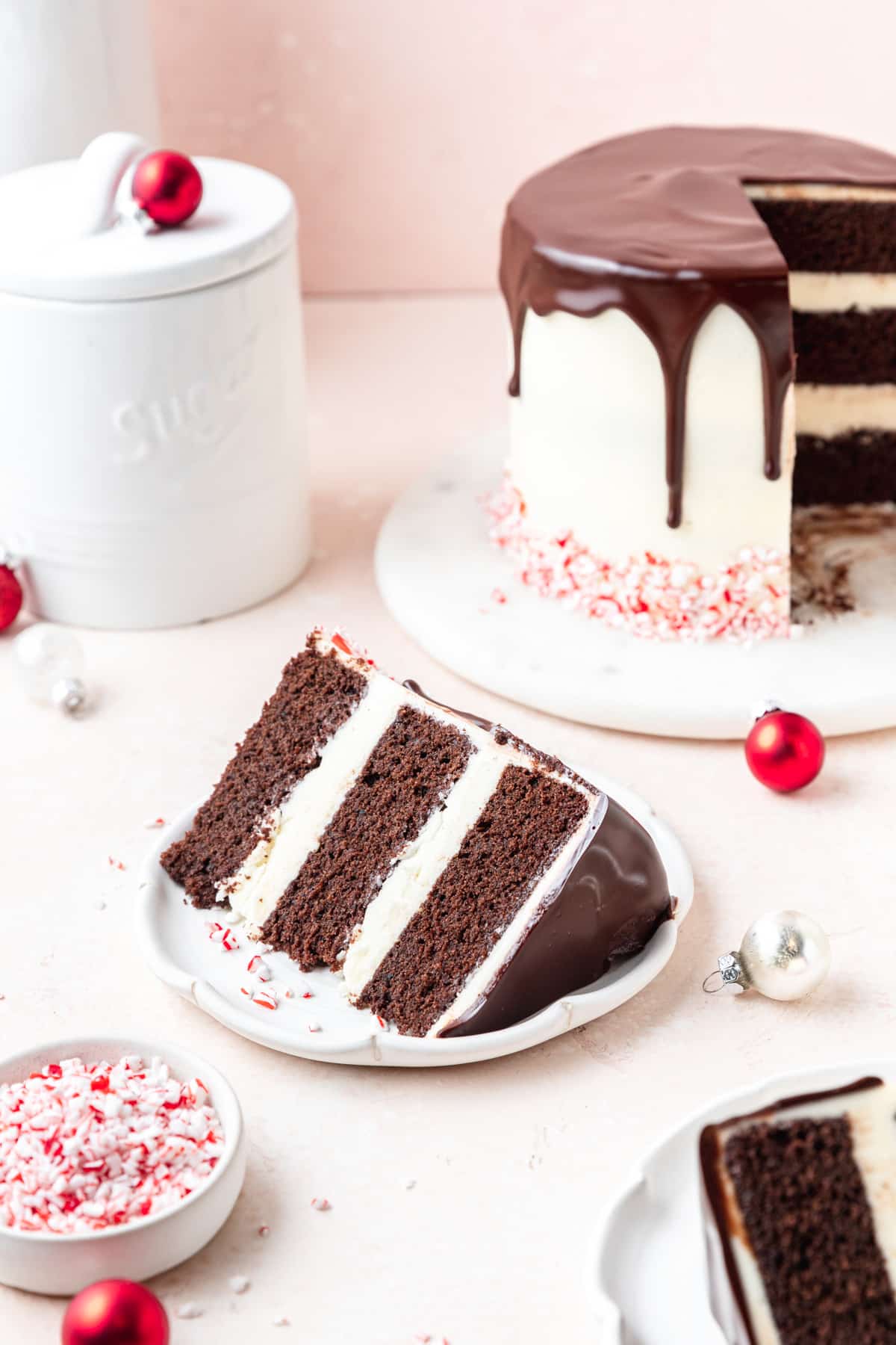 slice of chocolate peppermint layer cake on plate.