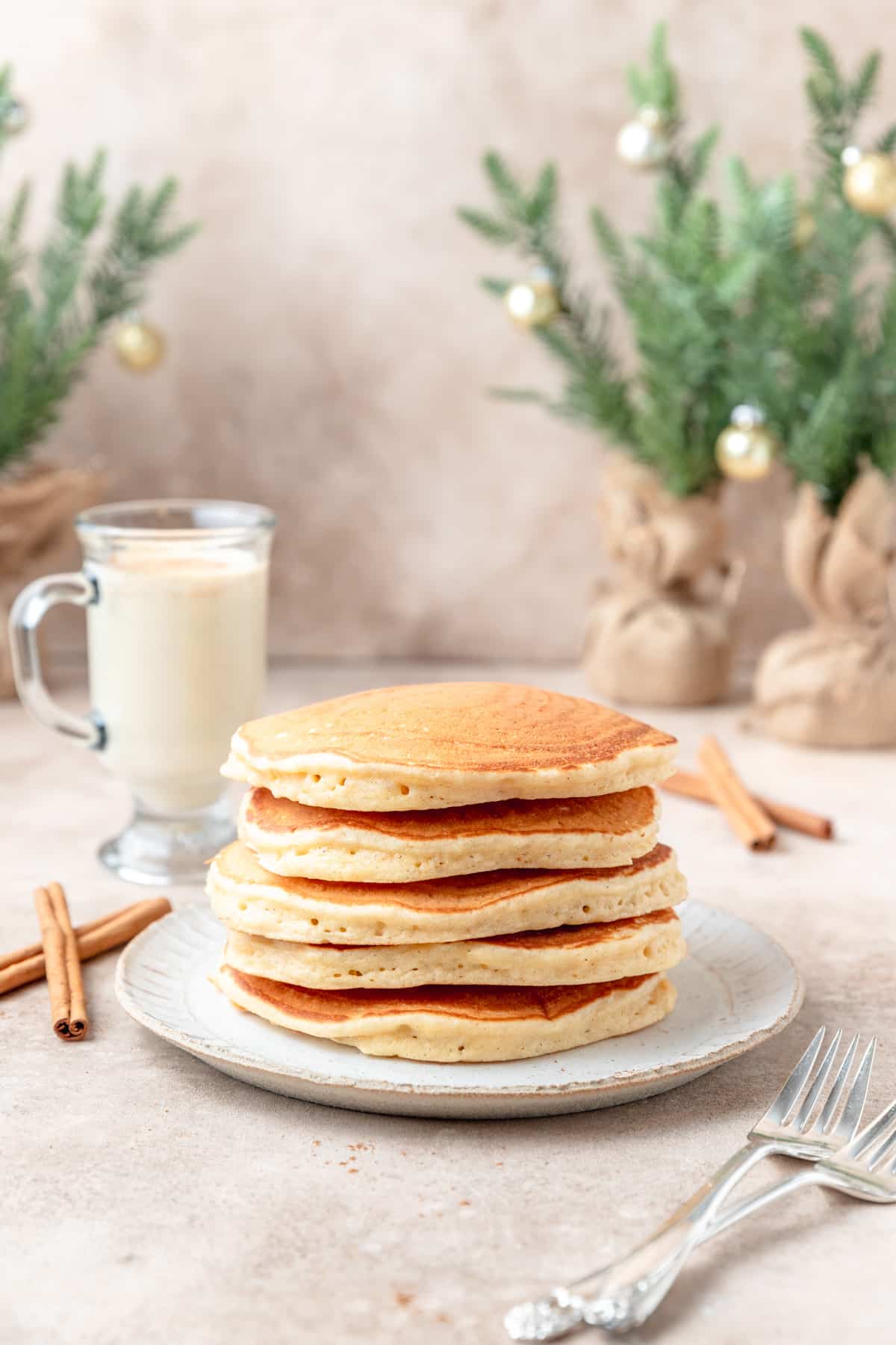 stack of cooked eggnog pancakes.