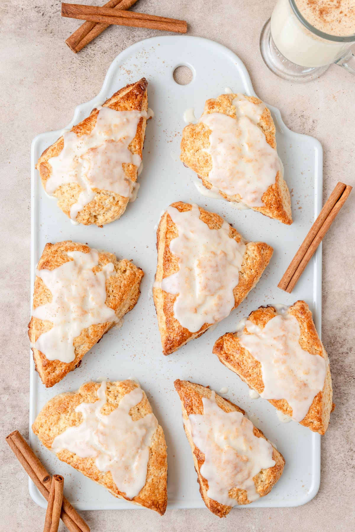 eggnog scones topped with eggnog glaze.