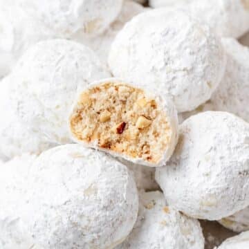 hazelnut snowball cookies tossed in powdered sugar.