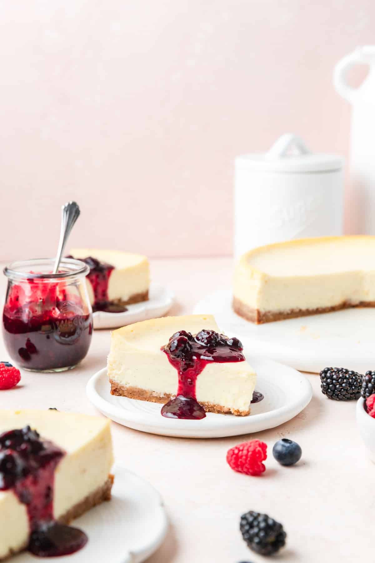 mascarpone cheesecake topped with mixed berry compote. 