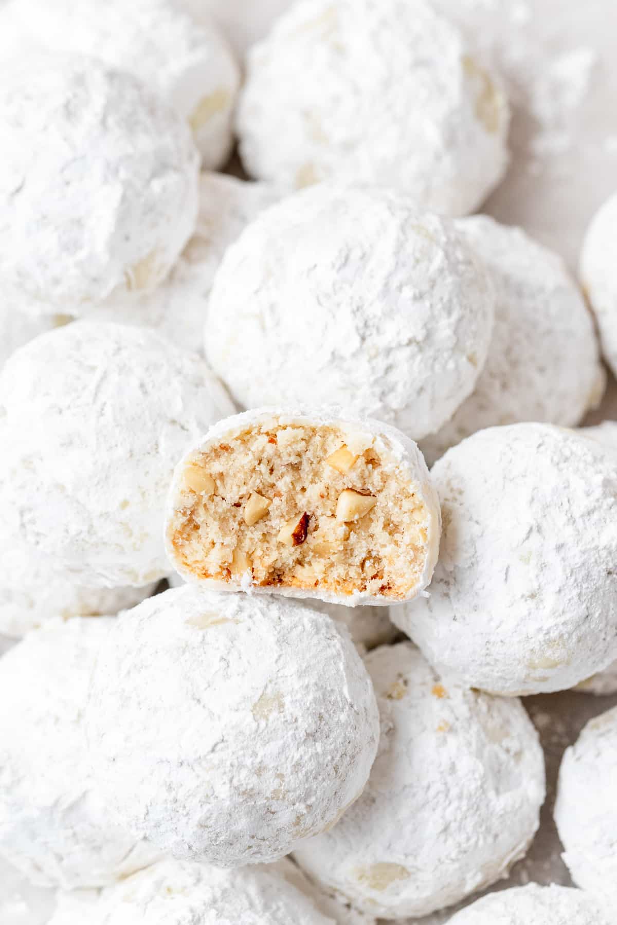 pile of hazelnut snowball cookies.