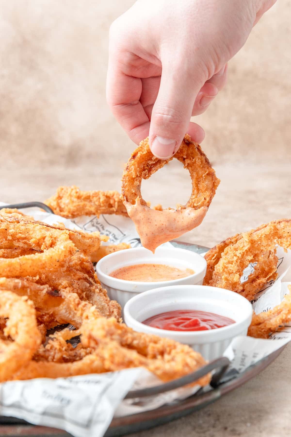onion ring dipped in fry sauce.