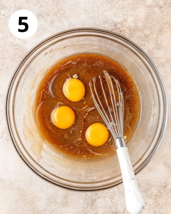 whisking eggs into filling.
