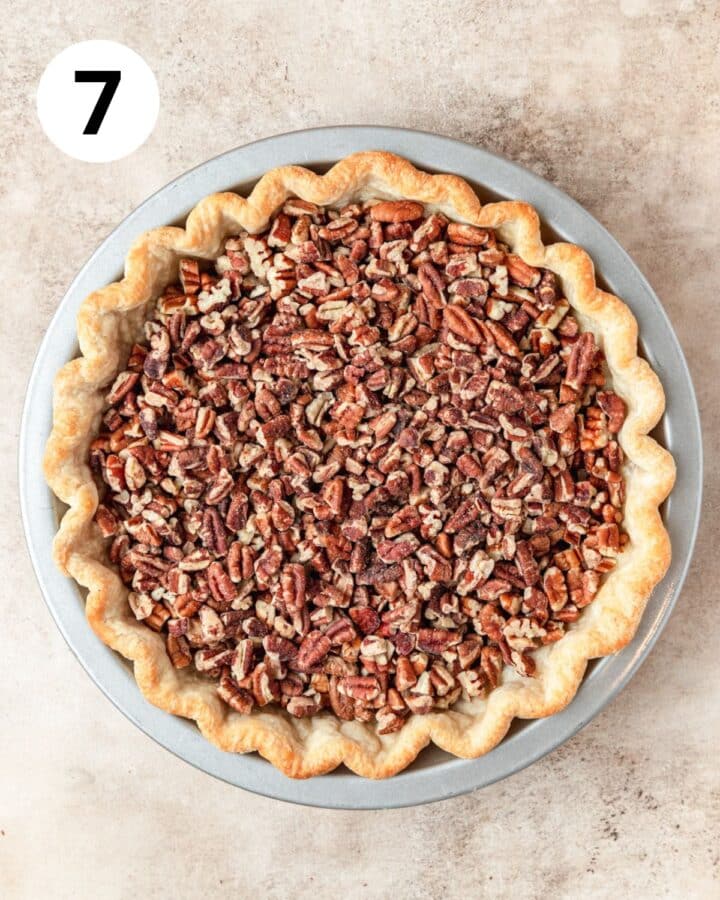 chopped pecans in bottom of pie crust.