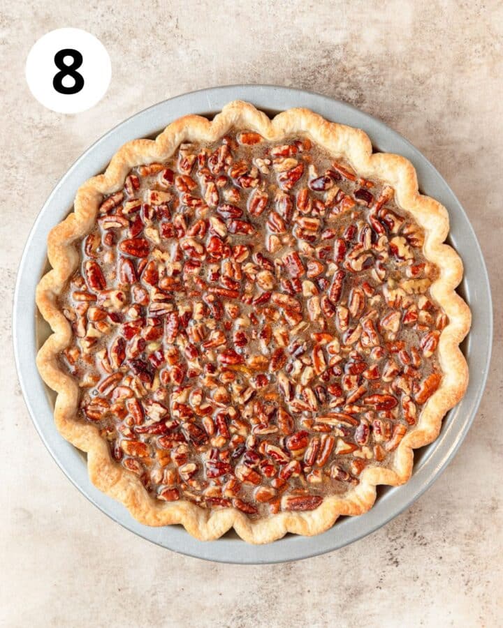 pouring filling over chopped pecans.