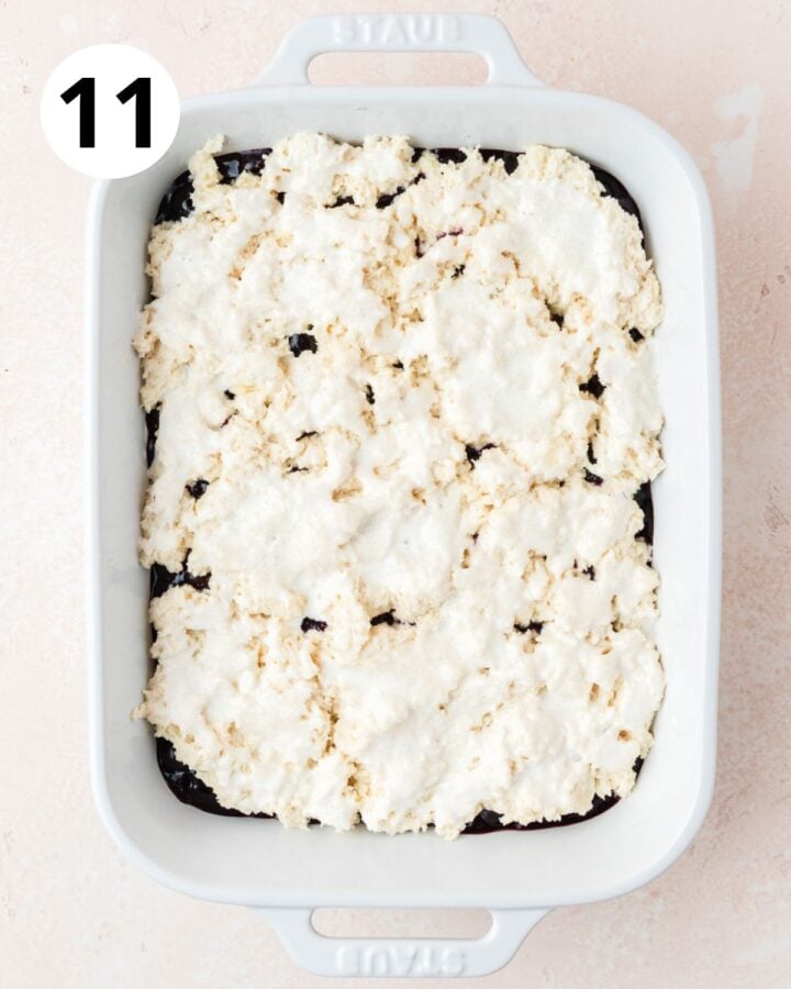 brushing top with cream and sprinkling with sugar.