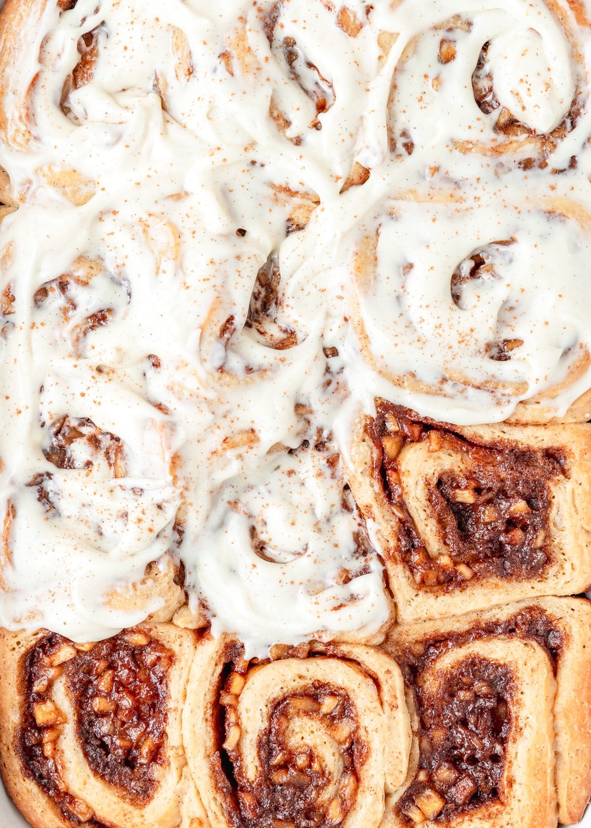 apple cinnamon rolls with cream cheese frosting.