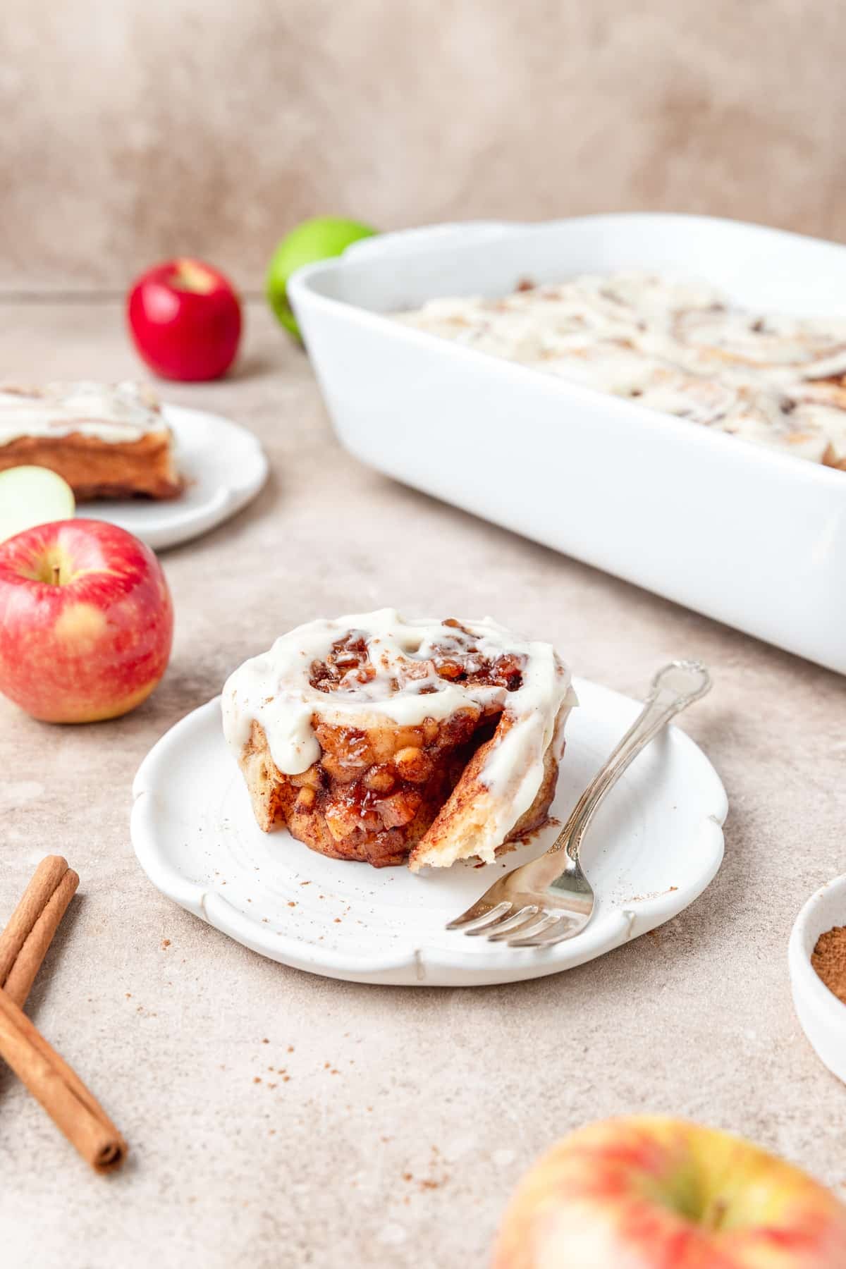 spiced apple cinnamon roll on plate.