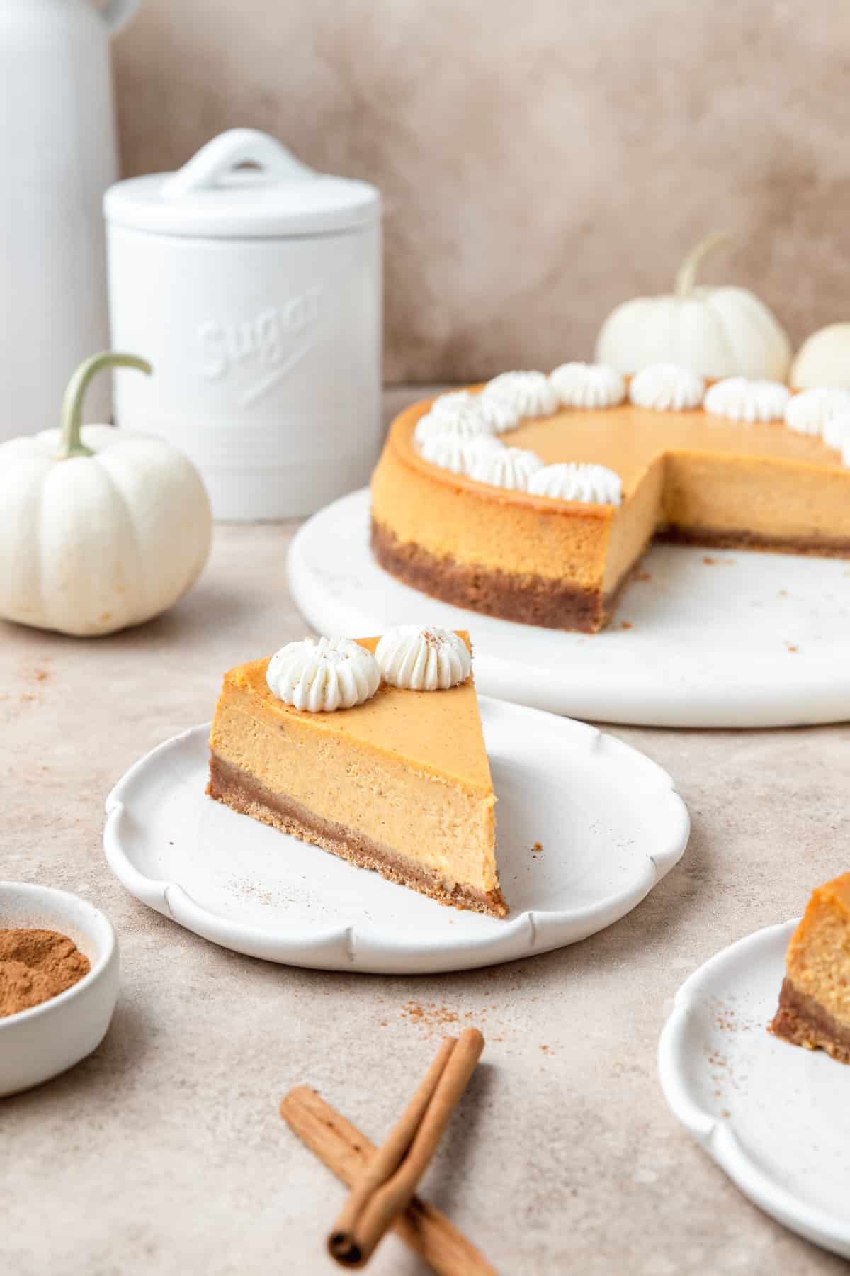 slice of pumpkin cheesecake on plate.